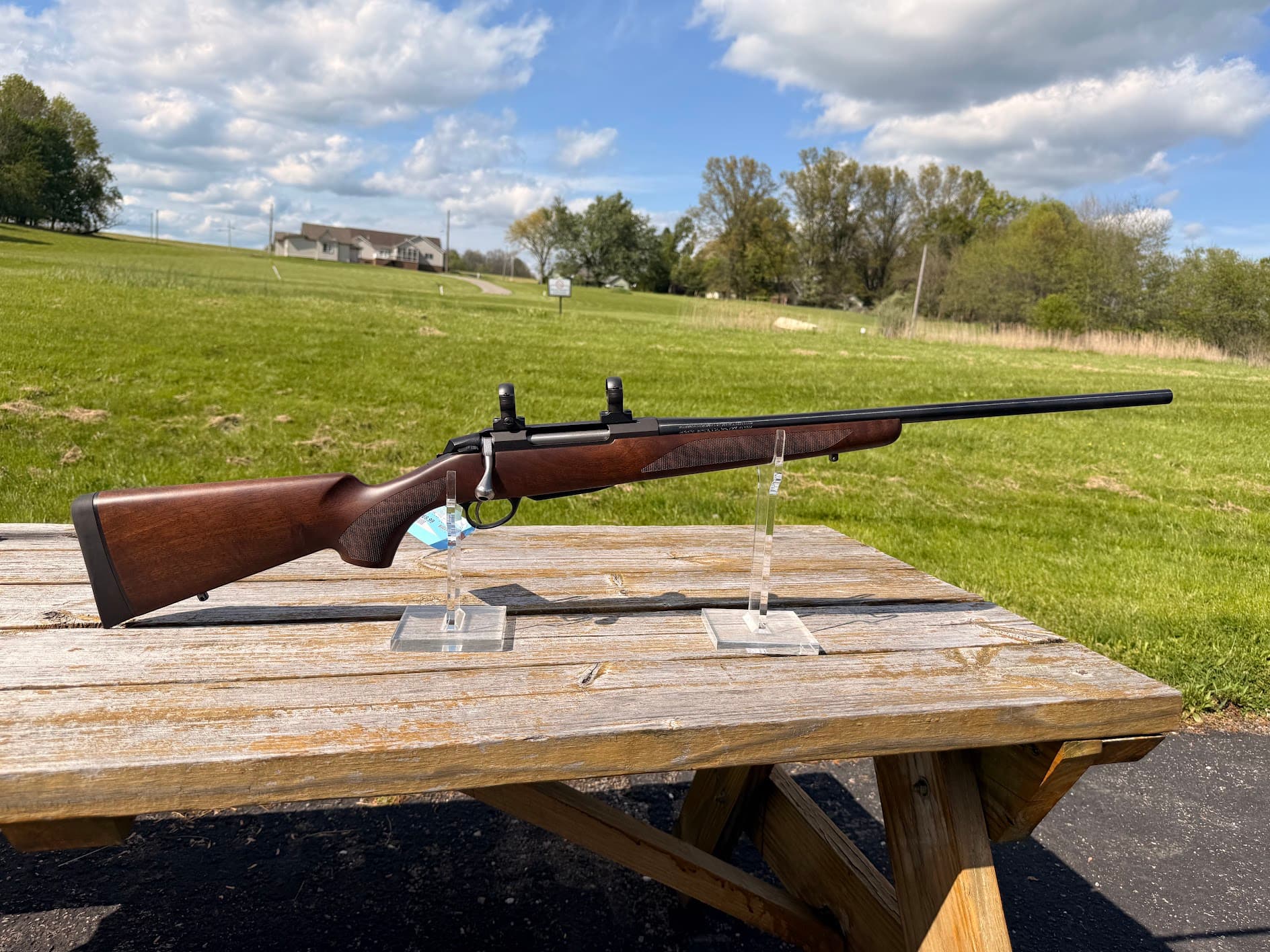 PRE-OWNED TIKKA T3X 243 WIN BOLT ACTION RIFLE 23" W/ SCOPE BASE AND RINGS