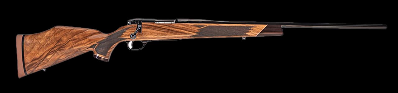 Weatherby Mark V Deluxe Varmintmaster 224 Weatherby Mag Threaded Barrel, Drilled & Tapped Steel Receiver, Monte Carlo High Gloss Walnut Wood Stock